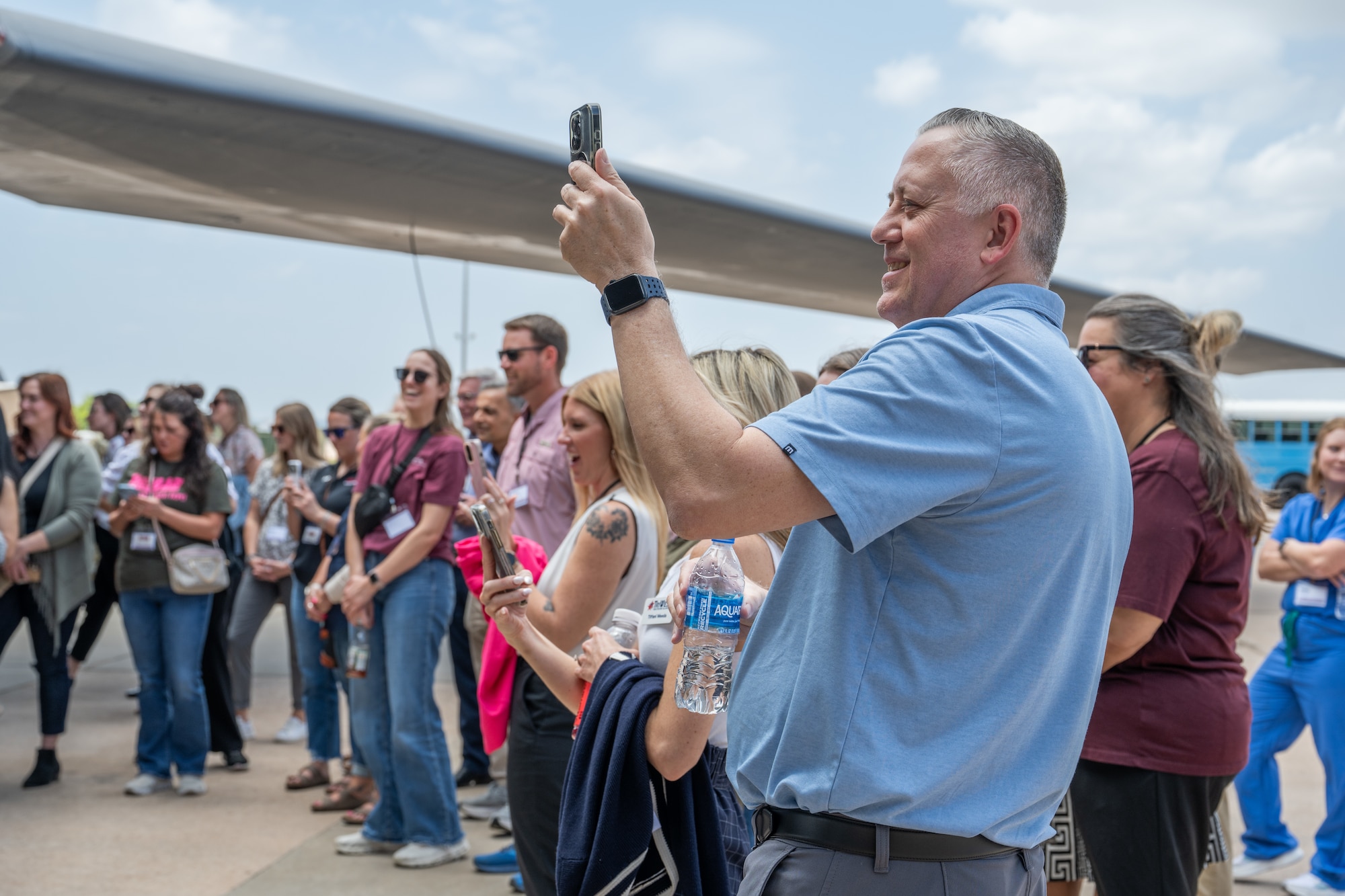 Abilene medical professionals watch a robotic dog demonstration during a medical provider collaboration tour at Dyess Air Force Base, Texas, May 8, 2026. The 7th Medical Group hosted the event to familiarize community healthcare partners with the installations operational mission, ensuring local providers have a deeper understanding of the Airmen the treat. (U.S. Air Force Photo by Airman 1st Class Caleb Schellenberg)