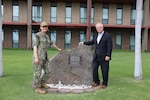 Under Secretary of War for Personnel and Readiness Anthony J. Tata and U.S. Navy Capt. Meghan Bodnar, deputy director for operations for the Defense POW/MIA Accounting Agency, visit the MI 17 Memorial on Heroes’ Green in front of the Daniel K. Inouye DPAA Center for Excellence at Joint Base Pearl Harbor–Hickam, Hawaii, on May 11, 2026.