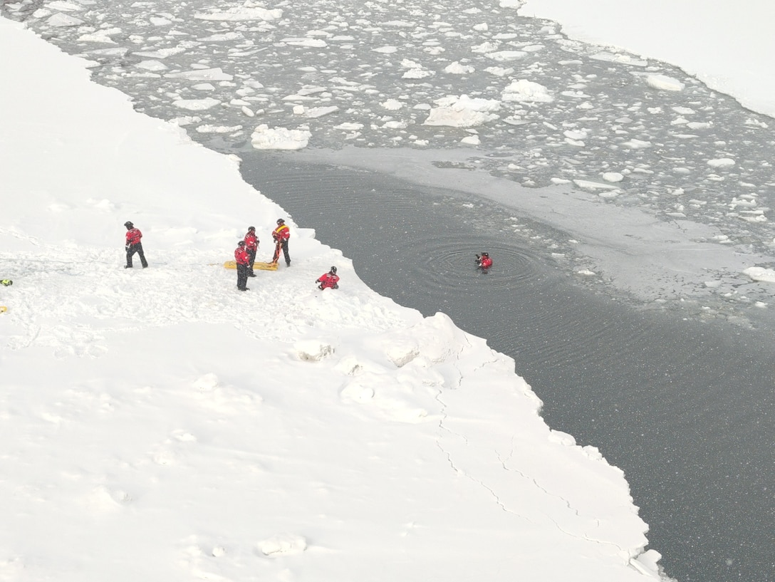 The USCGC Storis (WAGB 21) ice rescue team conducts on-ice training to prepare for search-and-rescue cases in the world’s harshest environments while patrolling the Bering Sea, April 16, 2026. The crew conducted advanced ice rescue training during the deployment and practiced complex lifesaving maneuvers in unforgiving Arctic conditions to prepare for high-risk search and rescue missions in ice‑covered waters. U.S. Coast Guard courtesy photo.