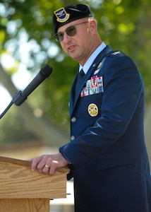 Col. Justin D. Secrest, 377th Air Base Wing and Installatino commander delivers closing remarks during the Police Week closing ceremony at Kirtland Air Force Base, New Mexico, on May 15, 2026. Police weeks is an annual event that serves to highlight the law enforcement official and the contributions they bring to the 377th Air Base Wing. 
(U.S. Air Force photo by Todd Berenger)