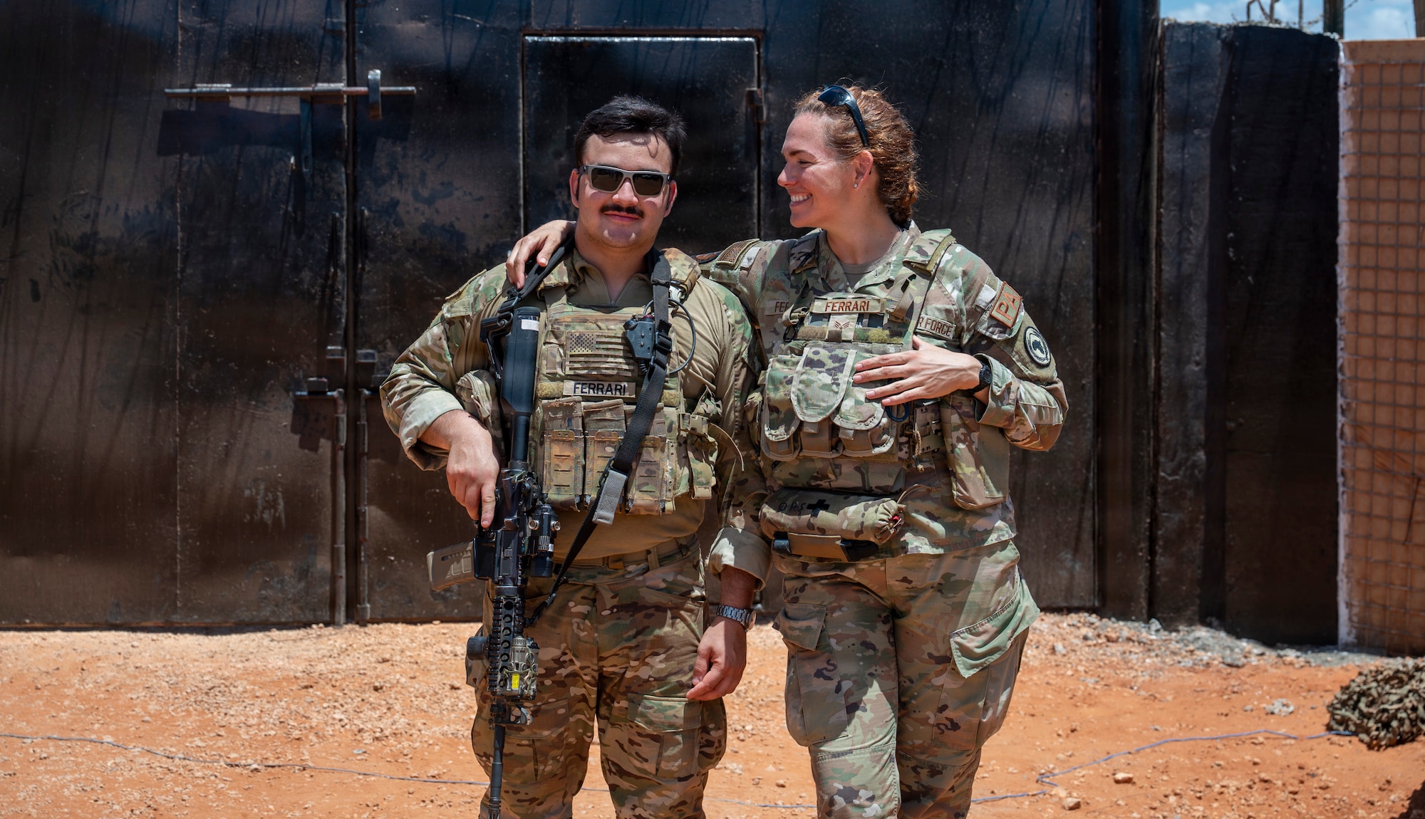 U.S. Air Force Senior Airman Michelle Ferrari, right, Combined Joint Task Force-Horn of Africa public affairs specialist, reunites with her son, U.S. Army Spc. Nicolas Ferrari, assigned to Bravo Company, 2nd Battalion, 124th Infantry Regiment, while deployed in East Africa, April 8, 2026. The reunion reflected the personal sacrifices and family connections recognized during Military Appreciation Month. (Courtesy photo)