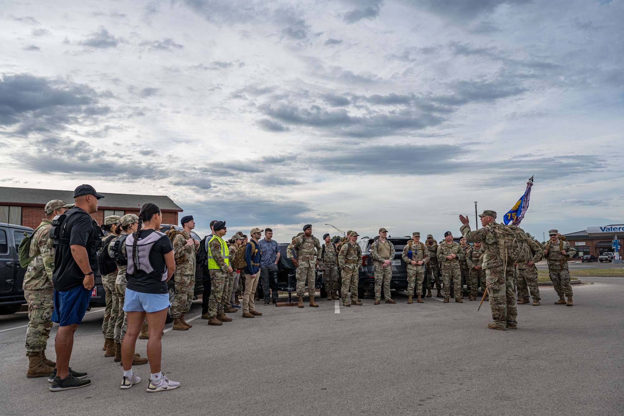Members of Team Dyess prepare for a 5K ruck during National Police Week at Dyess Air Force Base, Texas, May 11, 2026. The ruck served as an opportunity to recognize and reflect on the sacrifices of law enforcement officers who lost their lives in the line of duty. (U.S. Air Force photo by Airman 1st Class Caleb Schellenberg)