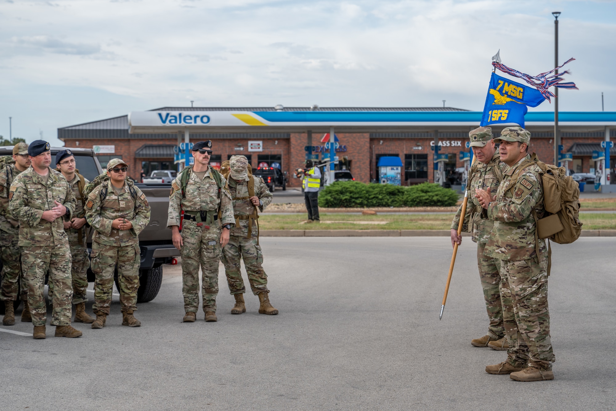 Members of Team Dyess prepare to begin a 5K ruck during National Police Week at Dyess Air Force Base, Texas, May 11, 2026. National Police Week is observed across the United States with memorial ceremonies, community outreach events and educational programs. (U.S. Air Force photo by Airman 1st Class Caleb Schellenberg)