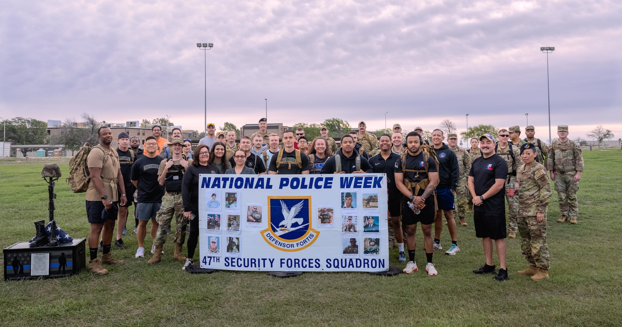 Airmen from the 47th Flying Training Wing come together for a group photo at Laughlin Air Force Base, Texas, May 4, 2026. Airmen participated in a 5K ruck march to kick off the events for police week. (U.S. Air Force photo by Airman 1st Class Harrison Sullivan)