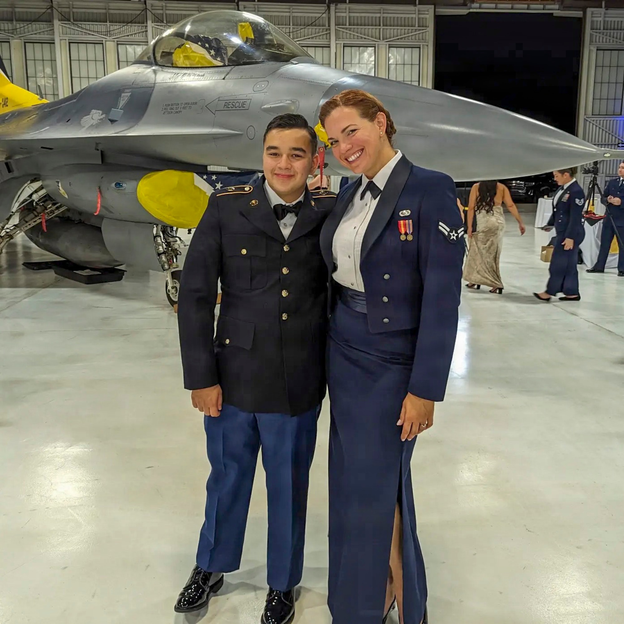 U.S. Air Force Airman 1st Class Michelle Ferrari, right, stands beside her son, U.S. Army cadet Nicolas Ferrari, during the 49th Wing Air Force Ball at Holloman Air Force Base, New Mexico, Sept. 24, 2023. The two would later reunite while deployed separately to East Africa in support of military operations in the region. (Courtesy photo)