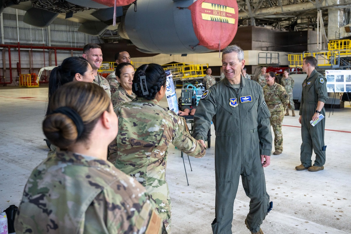 Air Force Chief of Staff Gen. Ken Wilsbach greets Team Hickam Airmen during his tour of the 15th Wing.