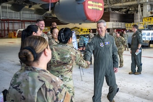 Air Force Chief of Staff Gen. Ken Wilsbach greets Team Hickam Airmen during his tour of the 15th Wing.