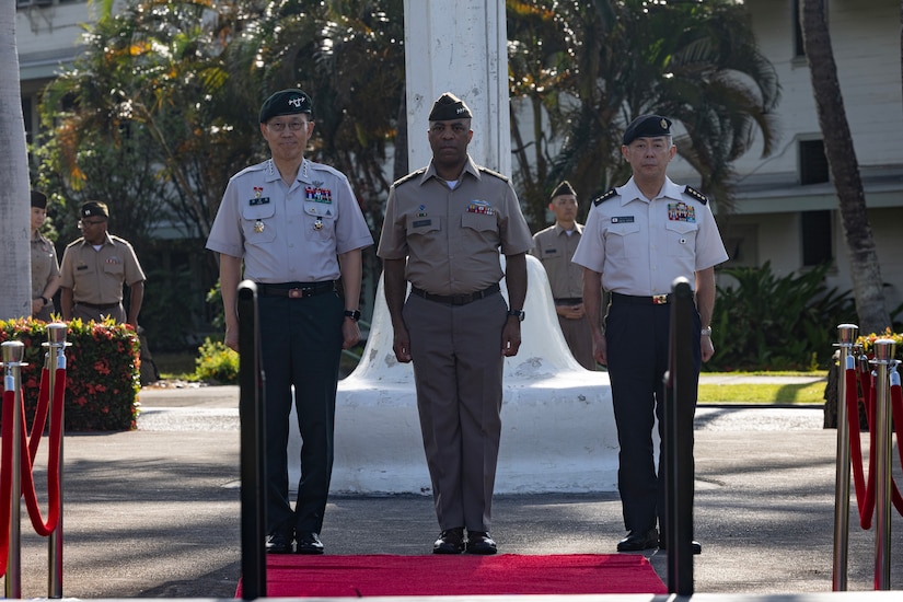 Korea Army Chief of Staff Gen. Gyuha Kim, U.S. Army Pacific Commanding General Gen. Ronald Clark, and Japanese Ground Self-Defense Force Chief of Staff Gen. Masayoshi Arai salute during an Honor Ceremony at Historic Palm Circle on May 15, 2026.