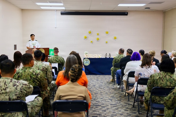 Lt. Isabel M. Jackabon (left), an emergency department nurse, and Lt. j.g. Duane Aldous V. Daquioag, a nurse assigned to the maternal infant nursing department, pose for a photo after being recognized with the 2026 DAISY Award for Extraordinary Nurses at Naval Hospital Twentynine Palms May 12, 2026. The DAISY Award statue, titled “A Healer’s Touch,” symbolizes the compassionate connection between nurses and their patients. Hand-carved by Shona artisans in Zimbabwe, the statue honors the extraordinary care nurses provide while supporting the artists’ community through the DAISY Foundation’s global recognition program. (U.S. Navy photo by Christopher Jones, NMRTC / NH Twentynine Palms public affairs officer)