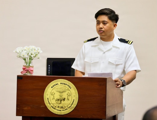 Lt. j.g. Joe Cabrera speaks during the opening remarks of the 2026 DAISY Award for Extraordinary Nurses ceremony at Naval Hospital Twentynine Palms May 12, 2026. The ceremony honored nurses recognized for their compassion, clinical excellence and dedication to patient-centered care in support of Navy Medicine and the Defense Health Agency mission. (U.S. Navy photo by Christopher Jones, NMRTC / NH Twentynine Palms public affairs officer)
