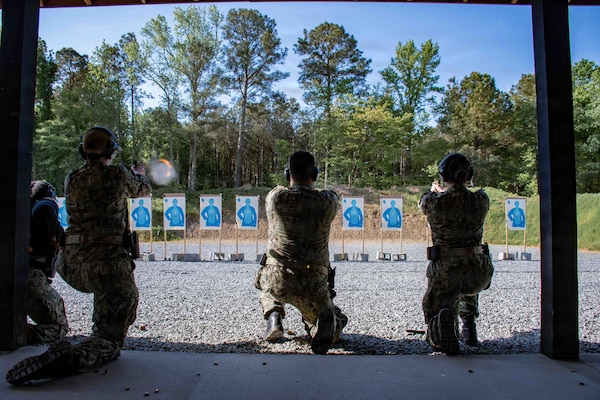 SUFFOLK, Va. (April 22, 2026) Expeditionary Medicine (ExMed) Sailors conduct a live-fire exercise for pistol qualification in Suffolk, Va., April 22, 2026. The week-long training exercise brought Naval Medical Forces Atlantic (NMFL) and Naval Medical Forces Pacific (NMFP) Expeditionary Medicine (ExMed) Sailors together for standardized combat skills training. (U.S. Navy photo by Mass Communication Specialist 2nd Class Thomas Boatright)