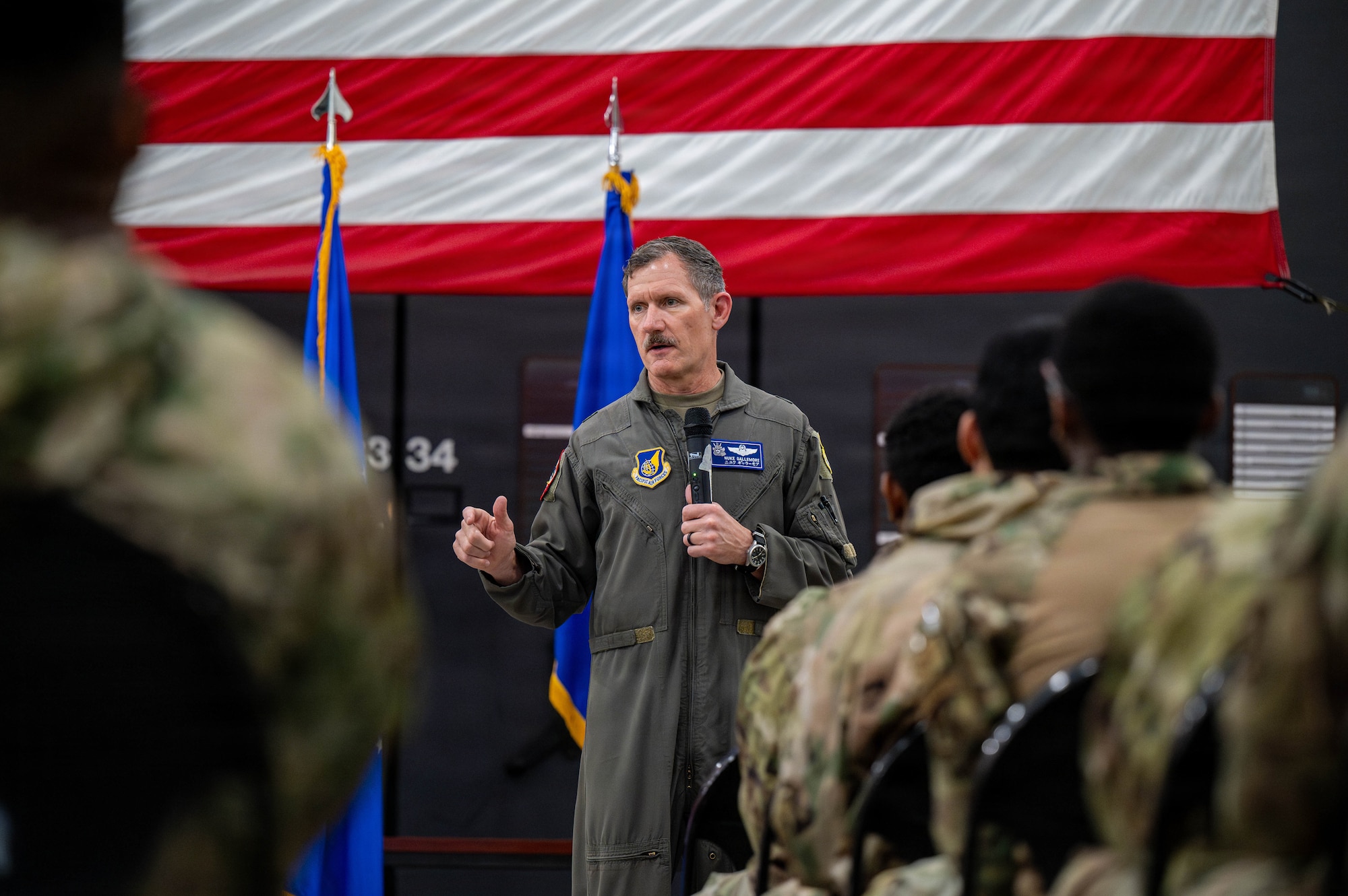 U.S. Air Force Brig. Gen John Gallemore, 18th Wing commander, delivers opening remarks during the Police Week opening ceremony.