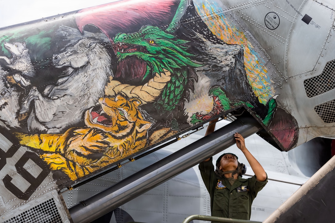 U.S. Marine checks bolts on a CH-53E Super Stallion helicopter during routine maintenance at Marine Corps Air Station Futenma, Okinawa, Japan, May 13, 2026.