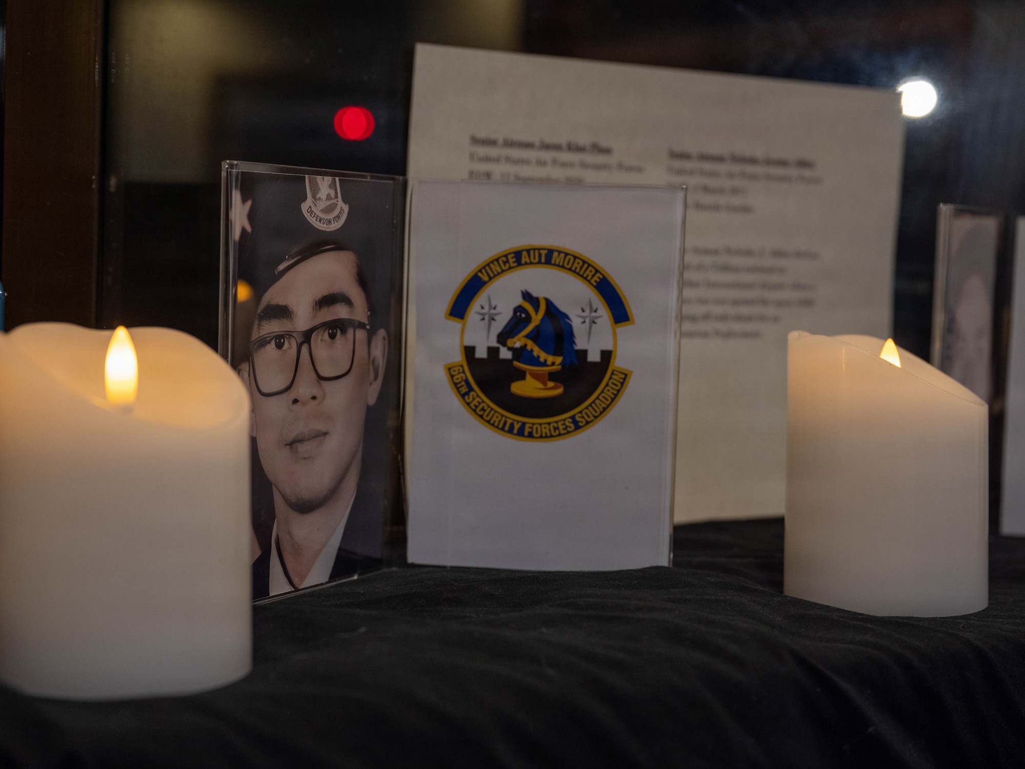 A portrait is displayed on a table.