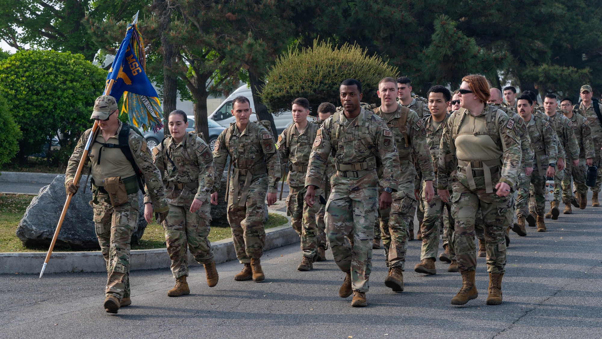 Airmen ruck.
