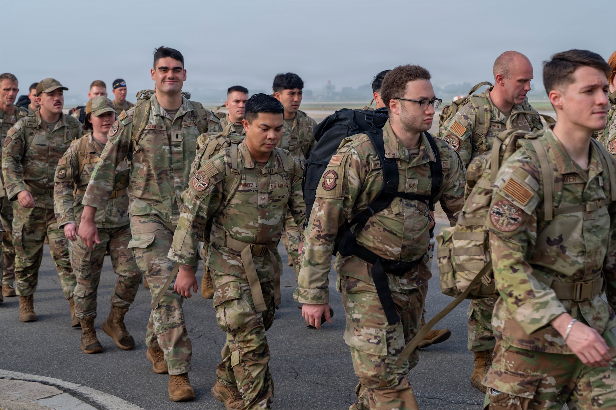 Airmen ruck.