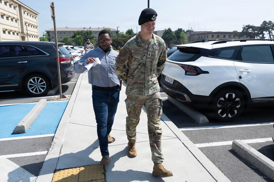 Airmen walk to the "Jail and Bail".