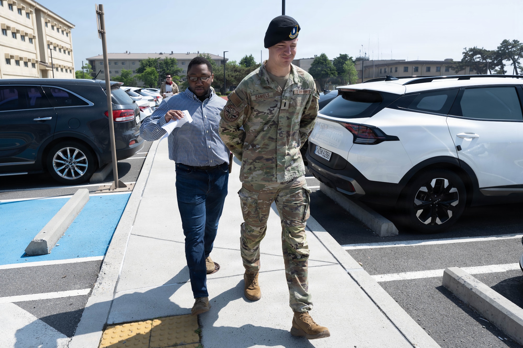 Airmen walk to the "Jail and Bail".