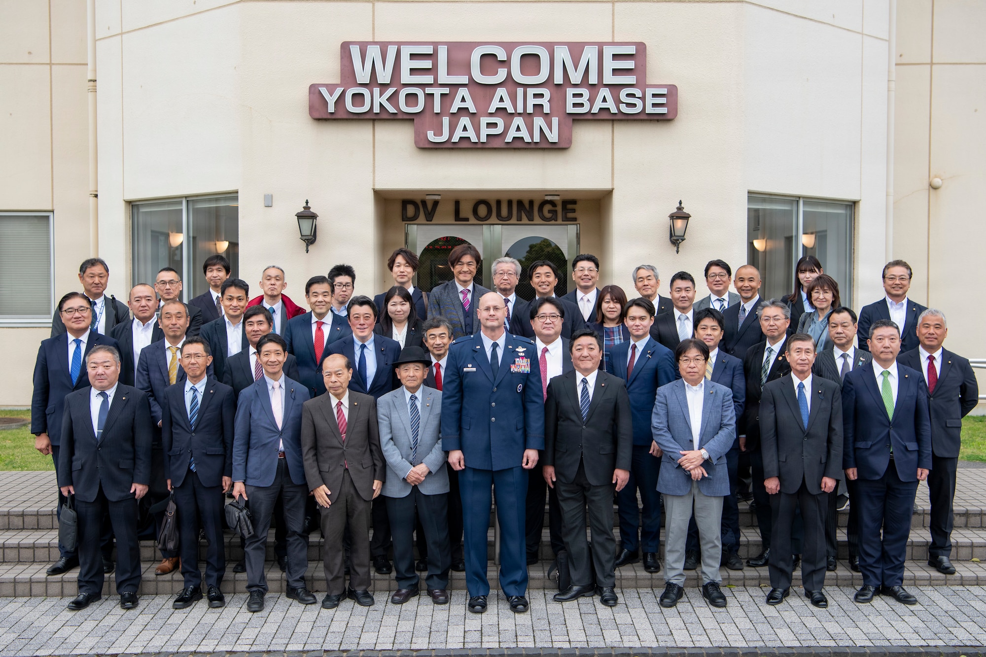 U.S. Air Force Col. Richard McElhaney, 374th Airlift Wing commander, poses for a photo with local council members outside the distinguished visitor lounge during a community relations tour at Yokota Air Base, Japan, April 30, 2026.
