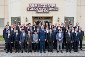 U.S. Air Force Col. Richard McElhaney, 374th Airlift Wing commander, poses for a photo with local council members outside the distinguished visitor lounge during a community relations tour at Yokota Air Base, Japan, April 30, 2026.