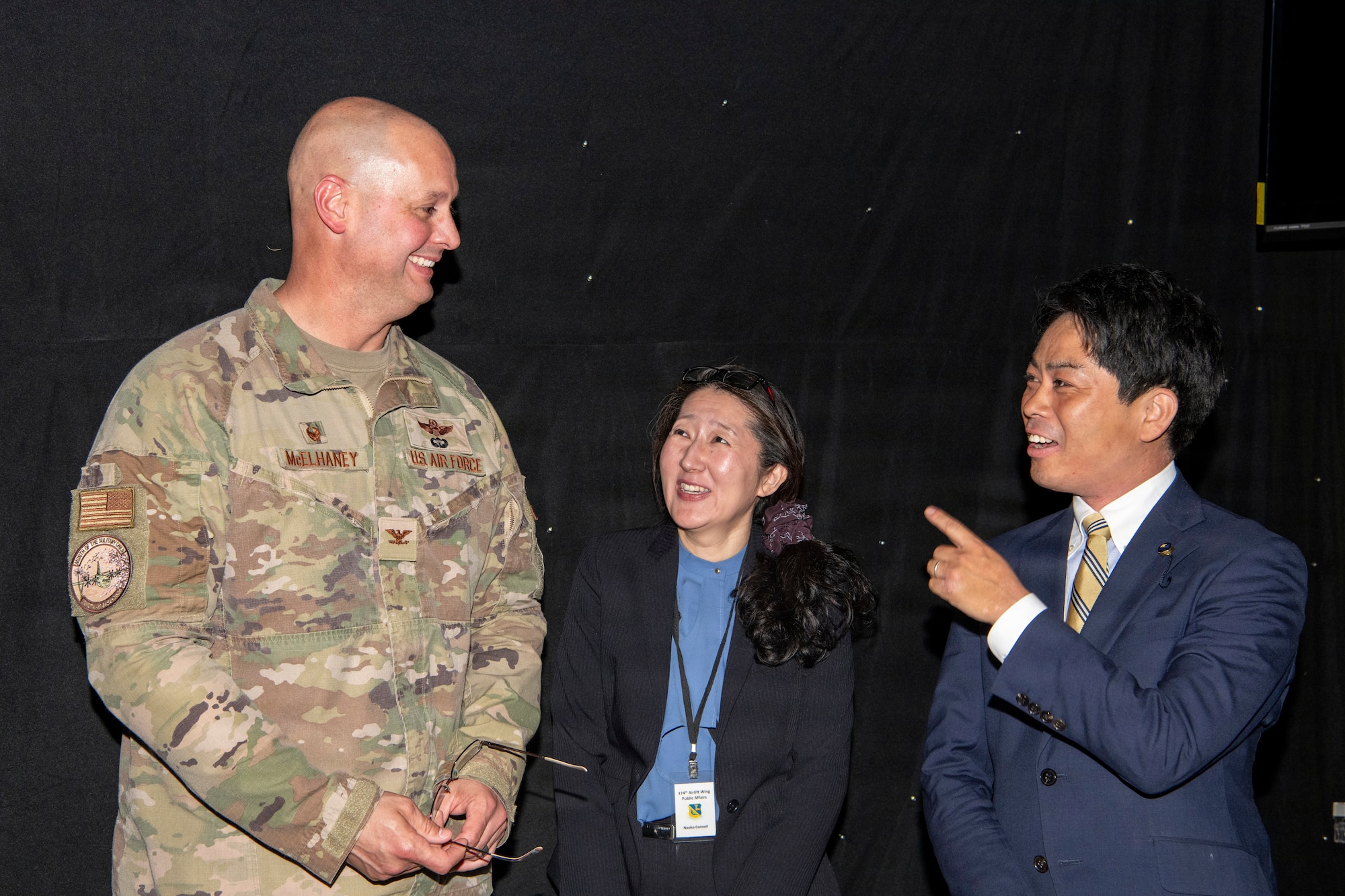 U.S. Air Force Col. Richard McElhaney, 374th Airlift Wing commander, speaks with a local council member during a community relations tour at Yokota Air Base, Japan, April 30, 2026.