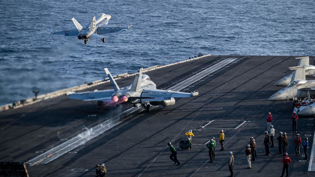 An F/A-18E Super Hornet, attached to Strike Fighter Squadron (VFA) 151, and an EA-18G Growler, attached to Electronic Attack Squadron (VAQ) 133, launch from the flight deck of Nimitz-class aircraft carrier USS Abraham Lincoln (CVN 72), May 9, 2026. Abraham Lincoln is deployed to the U.S. 5th Fleet area of operations to support maritime security and stability in the Middle East. (U.S. Navy photo)