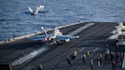 An F/A-18E Super Hornet, attached to Strike Fighter Squadron (VFA) 151, and an EA-18G Growler, attached to Electronic Attack Squadron (VAQ) 133, launch from the flight deck of Nimitz-class aircraft carrier USS Abraham Lincoln (CVN 72), May 9, 2026. Abraham Lincoln is deployed to the U.S. 5th Fleet area of operations to support maritime security and stability in the Middle East. (U.S. Navy photo)