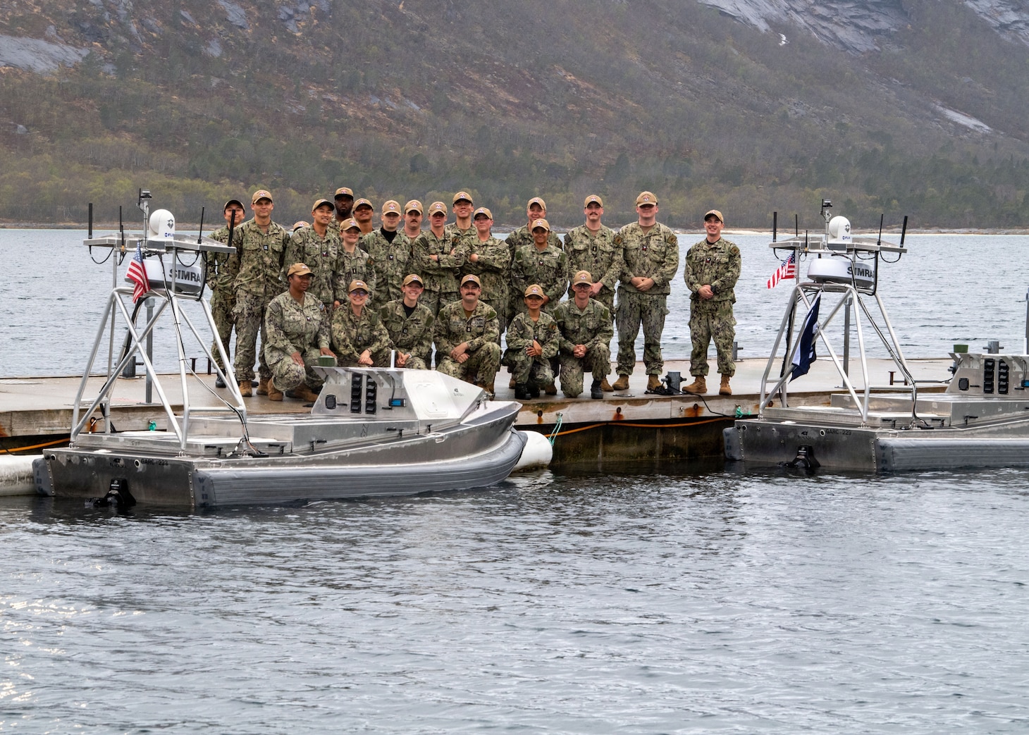 RAMSUND, Norway (May 12, 2026) — Commander, Task Force (CTF) 66 and Unmanned Surface Vessel Squadron Three (USVRON 3) Division 32 personnel pose for a photo during Arctic Sentry 2026.