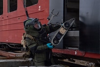 U.S. Navy explosive ordnance disposal (EOD) technicians, assigned to EOD Mobile Unit 8, conduct an improvised explosive device drill using a remotely operated robot while training alongside forces from the Royal Norwegian Navy during a bilateral exercise in Ramsund, Norway, May 12, 2026.