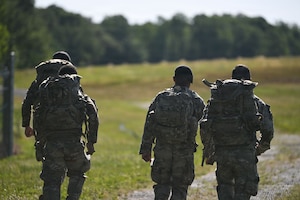 Airmen assigned to the 316th Security Forces Squadron participate in a ruck march during a warrior challenge in honor of National Police Week at Joint Base Andrews, Maryland, May 13, 2026.