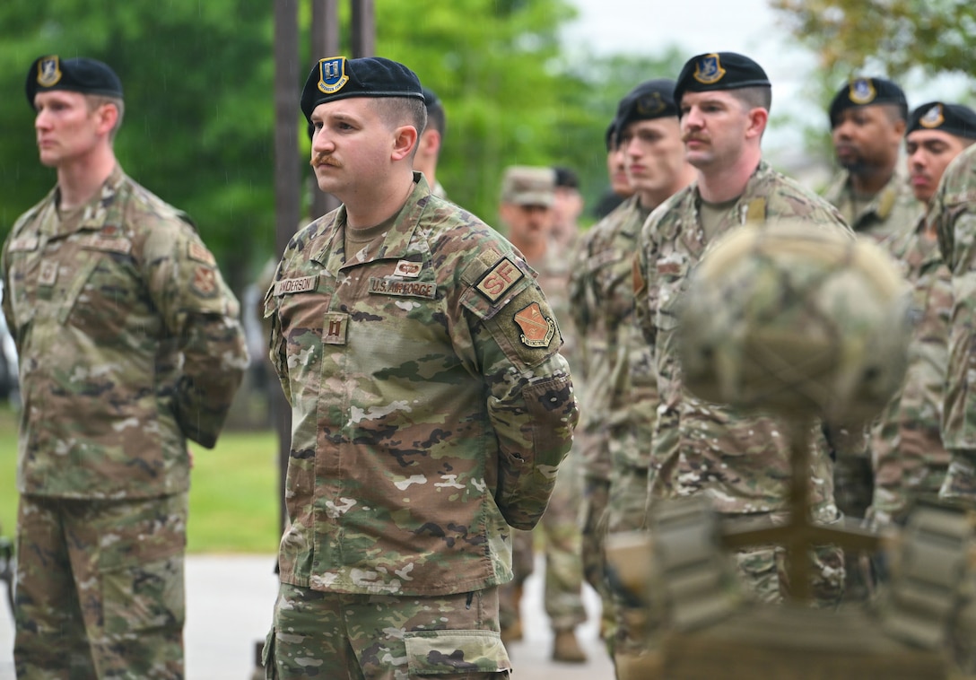 Airmen assigned to the 316th Security Forces Group gather to pay tribute to fallen defenders during the opening ceremony for National Police Week at Joint Base Andrews, Maryland, May 11, 2026.