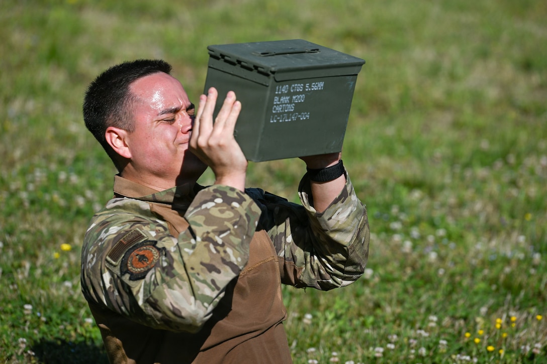U.S. Air Force Staff Sgt. Brandon Novelo, 316th Security Forces Squadron investigator, participates in the physical training circuit of a warrior challenge during National Police Week at Joint Base Andrews, Maryland, May 13, 2026.