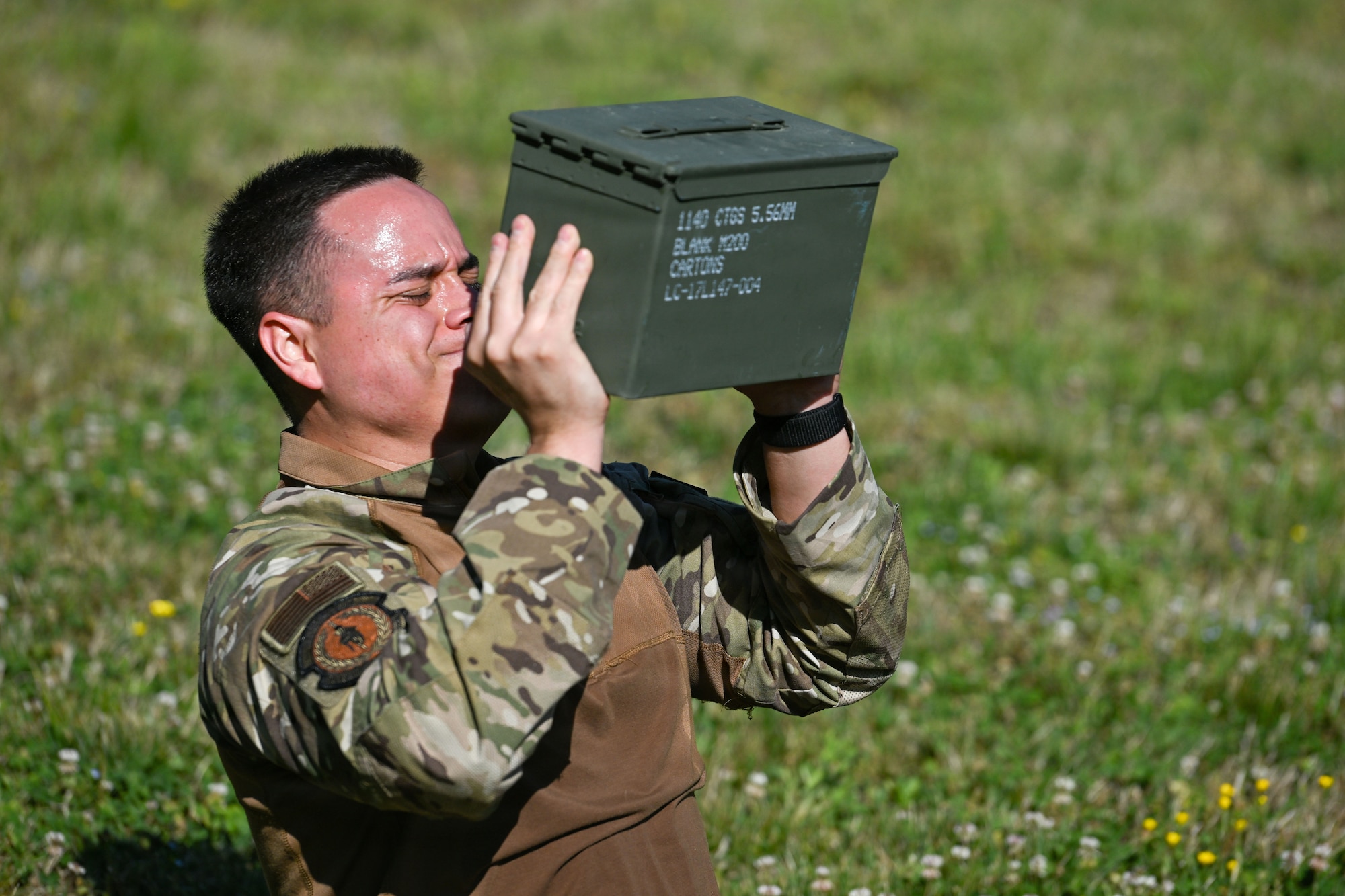 U.S. Air Force Staff Sgt. Brandon Novelo, 316th Security Forces Squadron investigator, participates in the physical training circuit of a warrior challenge during National Police Week at Joint Base Andrews, Maryland, May 13, 2026.