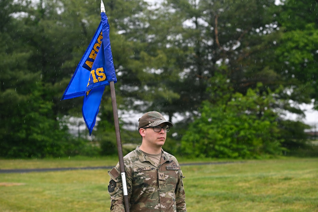 U.S. Air Force Staff Sgt. Patrick Kelly, Office of Special Investigations 2nd Field Investigations Squadron investigator, carries the guidon during a memorial ruck during National Police Week at Joint Base Andrews, Maryland, May 11, 2026.