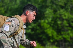 U.S. Air Force Airman 1st Class Mahmoud Ramadan, 11th Security Forces Squadron installation entry controller, competes in a warrior challenge during National Police Week at Joint Base Andrews, Maryland, May 13, 2026.