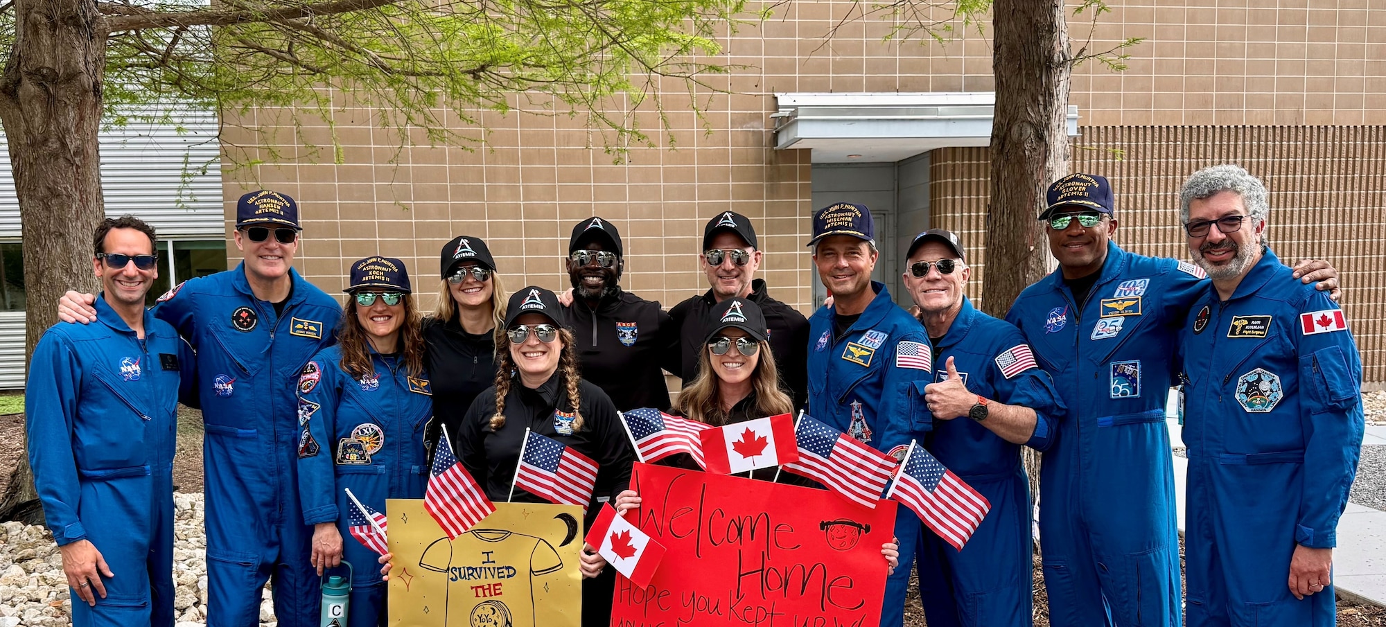 Image of people posing for a photo.