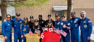 Image of people posing for a photo.