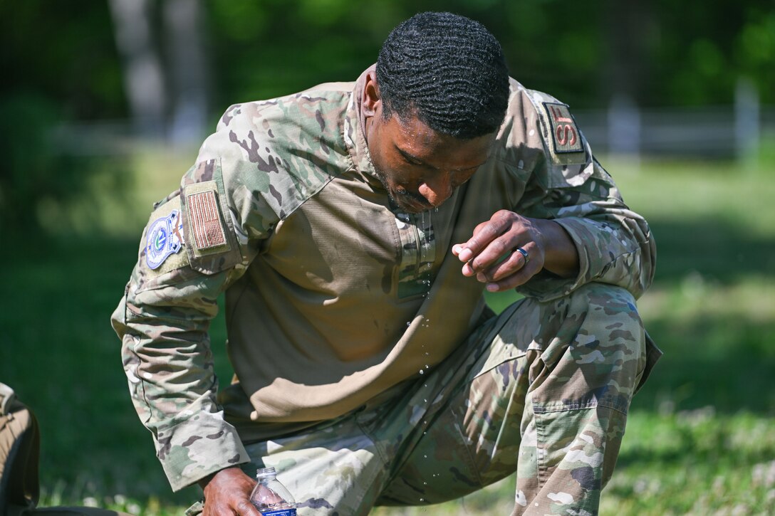 U.S. Air Force Staff Sgt. Jalen McGill, 11th Security Forces Squadron patrolman, cools down during the physical training portion of a warrior challenge during Police Week at Joint Base Andrews, Maryland, May 13, 2026.