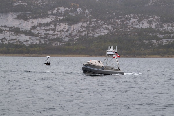 RAMSUND, Norway (May 12, 2026) — A Global Autonomous Reconnaissance Craft and Lightfish Unmanned Surface Vessel, attached to Commander, Task Force (CTF) 66, operate in Breivika Bay during Arctic Sentry 2026.