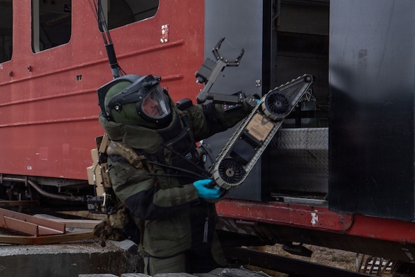 U.S. Navy explosive ordnance disposal (EOD) technicians, assigned to EOD Mobile Unit 8, conduct an improvised explosive device drill using a remotely operated robot while training alongside forces from the Royal Norwegian Navy during a bilateral exercise in Ramsund, Norway, May 12, 2026.