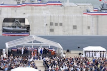 CLEVELAND (May 16, 2026) – Attendees salute while colors are paraded during the commissioning ceremony of the Navy’s last Freedom-variant littoral combat ship USS Cleveland (LCS 31) in Cleveland. Cleveland is the fourth warship to be named after Ohio’s second largest city and is the 16th and final Freedom-variant littoral combat ship (LCS) to be built and commissioned in the U.S. Navy. (U.S. Navy photo by Mass Communication Specialist 2nd Class Kenneth Blair)