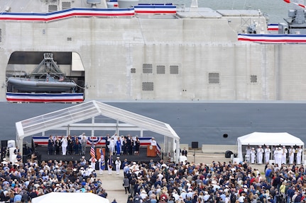 CLEVELAND (May 16, 2026) – Attendees salute while colors are paraded during the commissioning ceremony of the Navy’s last Freedom-variant littoral combat ship USS Cleveland (LCS 31) in Cleveland. Cleveland is the fourth warship to be named after Ohio’s second largest city and is the 16th and final Freedom-variant littoral combat ship (LCS) to be built and commissioned in the U.S. Navy. (U.S. Navy photo by Mass Communication Specialist 2nd Class Kenneth Blair)