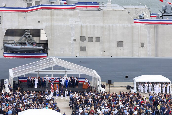 CLEVELAND (May 16, 2026) – Attendees salute while colors are paraded during the commissioning ceremony of the Navy’s last Freedom-variant littoral combat ship USS Cleveland (LCS 31) in Cleveland. Cleveland is the fourth warship to be named after Ohio’s second largest city and is the 16th and final Freedom-variant littoral combat ship (LCS) to be built and commissioned in the U.S. Navy. (U.S. Navy photo by Mass Communication Specialist 2nd Class Kenneth Blair)