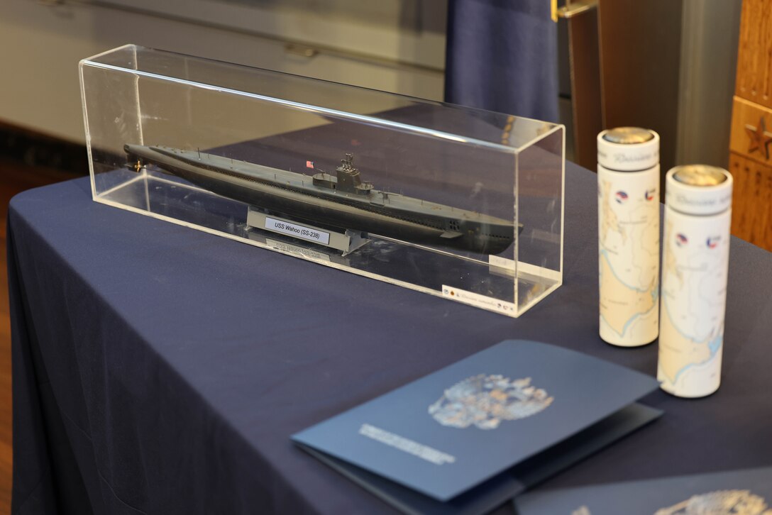 The U.S.-Russia Joint Commission on POW/MIAs held a special ceremony at the Navy Memorial in Washington, D.C., May 15 for submariners of the USS Wahoo, lost during World War II, during which soil, water, and video from the site where the Wahoo sank, as well as a model of the Wahoo, was given to the U.S. by Russia. The Russian Federation Ambassador to the United States, H. E. Alexander Darchiev, presented the containers of soil and water, the video, and the model to retired Air Force Gen. Robert “Doc” Fogelsong, the United States Side Chairman of the USRJC, who accepted on behalf of the United States and the families of the USS Wahoo submariners. (Photo by Sean Everette, Defense POW/MIA Accounting Agency)