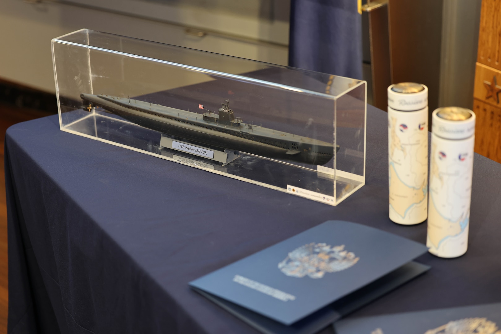 The U.S.-Russia Joint Commission on POW/MIAs held a special ceremony at the Navy Memorial in Washington, D.C., May 15 for submariners of the USS Wahoo, lost during World War II, during which soil, water, and video from the site where the Wahoo sank, as well as a model of the Wahoo, was given to the U.S. by Russia. The Russian Federation Ambassador to the United States, H. E. Alexander Darchiev, presented the containers of soil and water, the video, and the model to retired Air Force Gen. Robert “Doc” Fogelsong, the United States Side Chairman of the USRJC, who accepted on behalf of the United States and the families of the USS Wahoo submariners. (Photo by Sean Everette, Defense POW/MIA Accounting Agency)