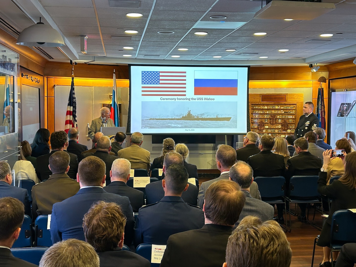 Retired Air Force Gen. Robert “Doc” Fogelsong, the United States Side Chairman of the the U.S.-Russia Joint Commission on POW/MIAs, speaks during a special ceremony at the Navy Memorial Visitors Center in Washington, D.C., May 15 for submariners of the USS Wahoo, lost during which soil, water, and video from the site where the Wahoo sank, as well as a model of the Wahoo, was given to the U.S. by Russia. The Russian Federation Ambassador to the United States, H. E. Alexander Darchiev, presented the containers of soil and water, the video, and the model to Fogelsong, who accepted on behalf of the United States and the families of the USS Wahoo submariners. (Photo by Sean Everette, Defense POW/MIA Accounting Agency)
