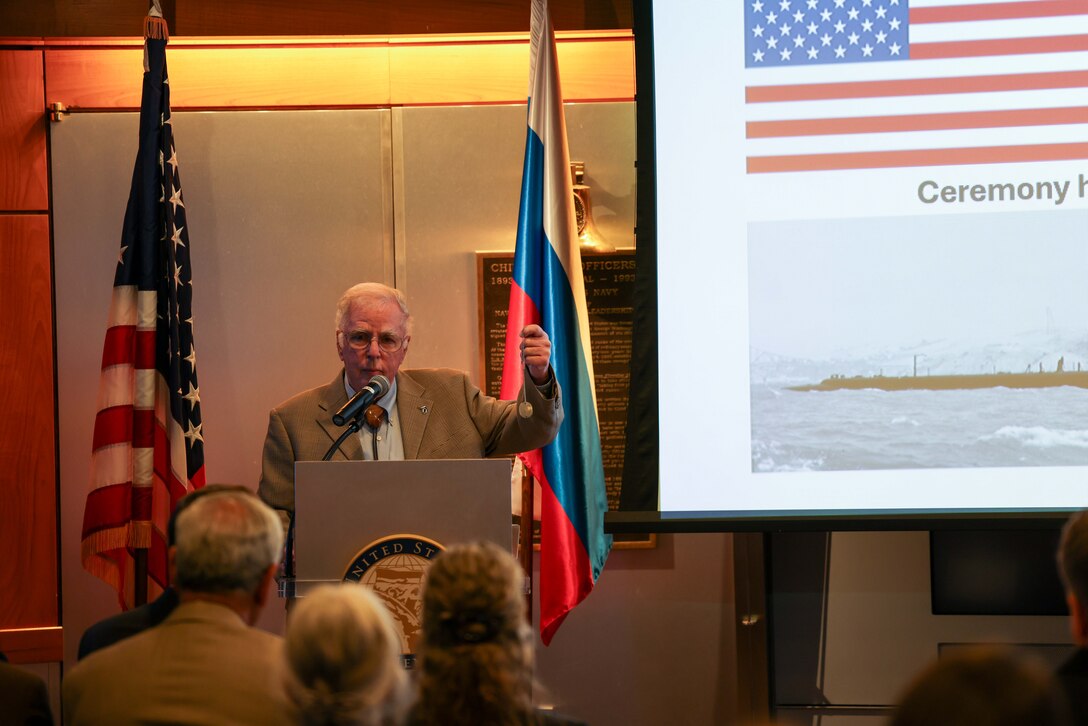 Retired Air Force Gen. Robert “Doc” Fogelsong, the United States Side Chairman of the U.S.-Russia Joint Commission on POW/MIAs, holds up his father's World War II ID tag while speaking during a special ceremony at the Navy Memorial in Washington, D.C., May 15 for submariners of the USS Wahoo, lost during which soil, water, and video from the site where the Wahoo sank, as well as a model of the Wahoo, was given to the U.S. by Russia. The Russian Federation Ambassador to the United States, H. E. Alexander Darchiev, presented the containers of soil and water, the video, and the model to Fogelsong, who accepted on behalf of the United States and the families of the USS Wahoo submariners. (Photo by Sean Everette, Defense POW/MIA Accounting Agency)