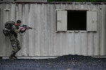 Spc. Javan Cooper, an 11B infantryman assigned to the Virginia Army National Guard’s 116th Mobile Brigade Combat Team, conducts urban movement during the Region II Best Warrior Competition May 6, 2026, at Camp Dawson near Kingwood, West Virginia. The multi-day competition includes finalists from Delaware, Maryland, Pennsylvania, Virginia, Washington, D.C., and West Virginia who will face a series of challenges, including multiple ruck marches, weapons proficiency tests, a written exam and essay, land navigation and an appearance board. The top competitors from the regional competition will represent the region at the national level later this year in Florida. (U.S. Army National Guard photo by Sgt. 1st Class Terra C. Gatti)