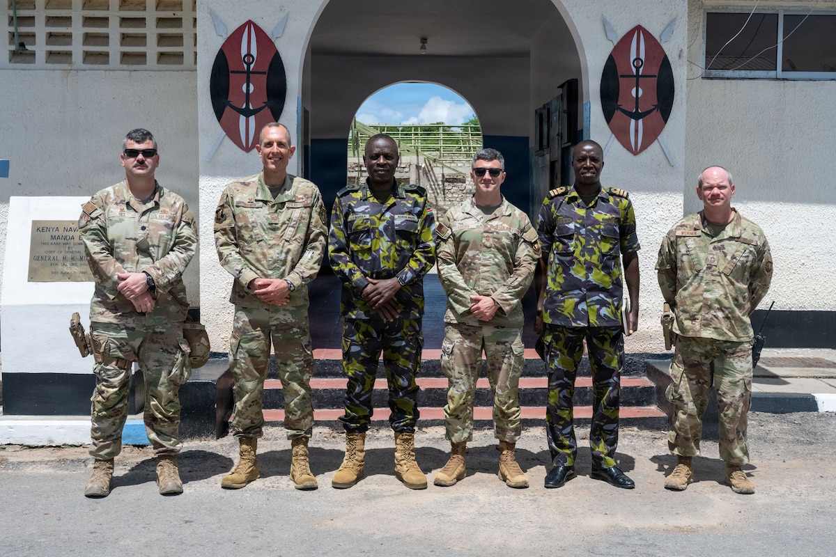 406th Air Expeditionary Wing leadership stands with members from the Kenya Defense Force at Manda Bay, Kenya, May 6, 2026. This meeting focused on continued cooperation between U.S. and Kenyan forces operating in the region. The meeting highlighted the importance of strong partnerships in supporting regional stability and shared security objectives. (U.S. Air Force photo by Maj. Porter Maerz)