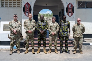 406th Air Expeditionary Wing leadership stands with members from the Kenya Defense Force at Manda Bay, Kenya, May 6, 2026. This meeting focused on continued cooperation between U.S. and Kenyan forces operating in the region. The meeting highlighted the importance of strong partnerships in supporting regional stability and shared security objectives. (U.S. Air Force photo by Maj. Porter Maerz)